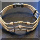 J168. Alor 18k yellow gold and steel cable bracelet w/triple twisted band and diamonds. - $395 